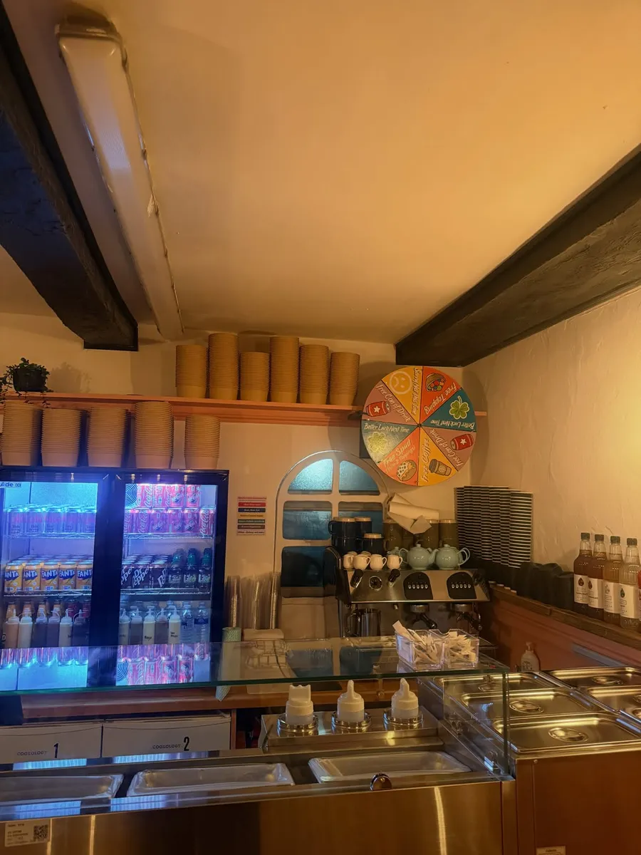 The Good Spud counter with drinks fridge, coffee machine and fresh toppings ready to serve